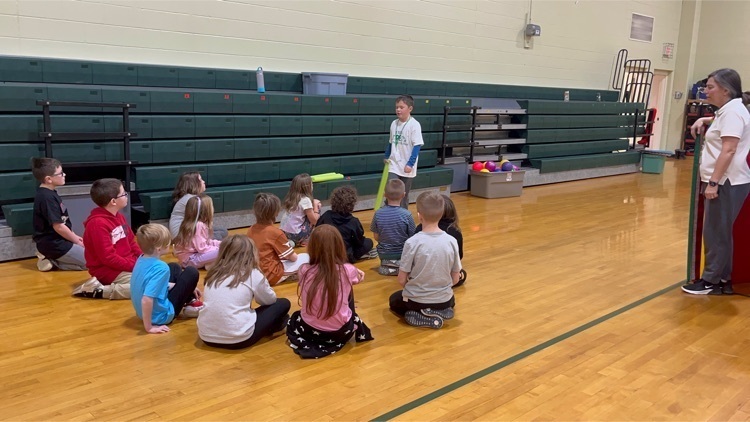 student leads a PE group 