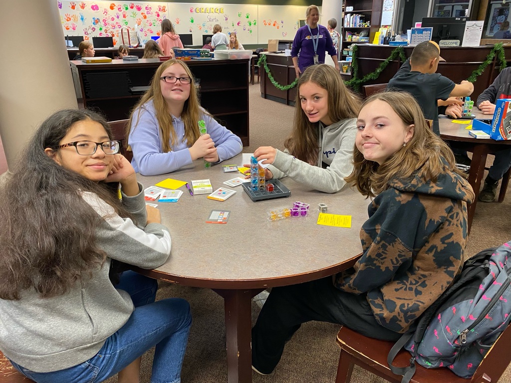 students working on puzzles