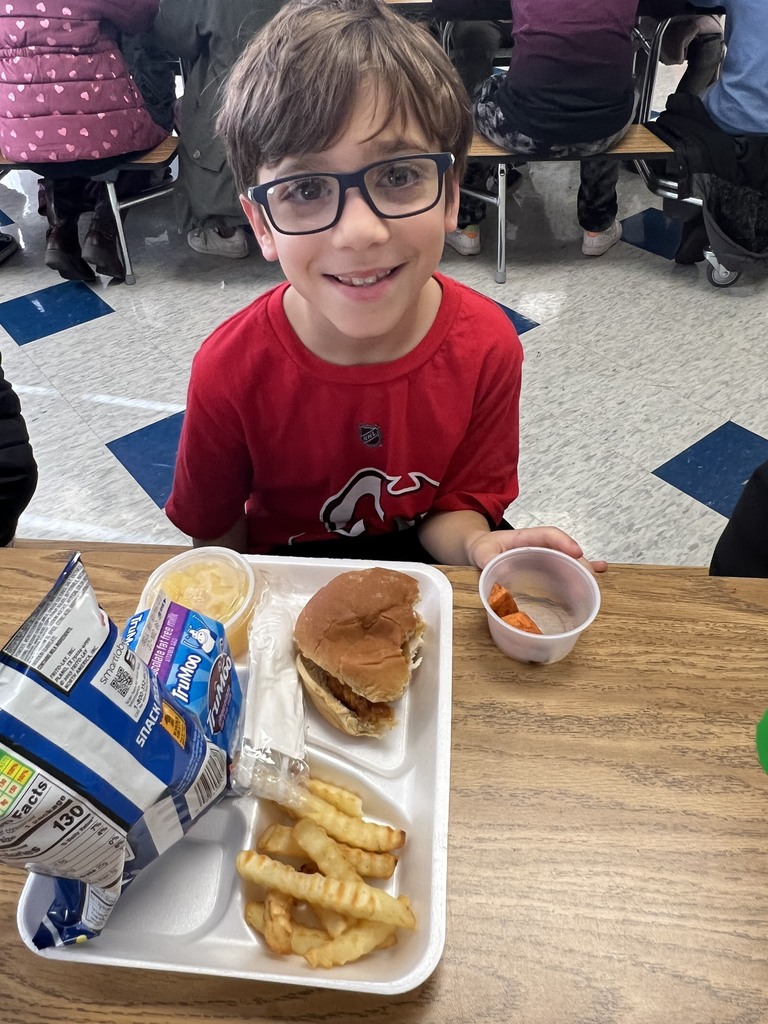 student eating sweet potatoes