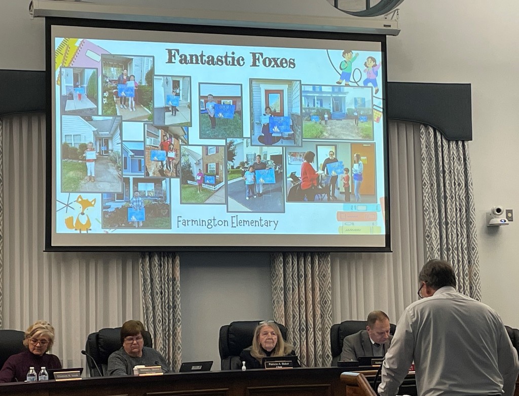 principal presenting to school board