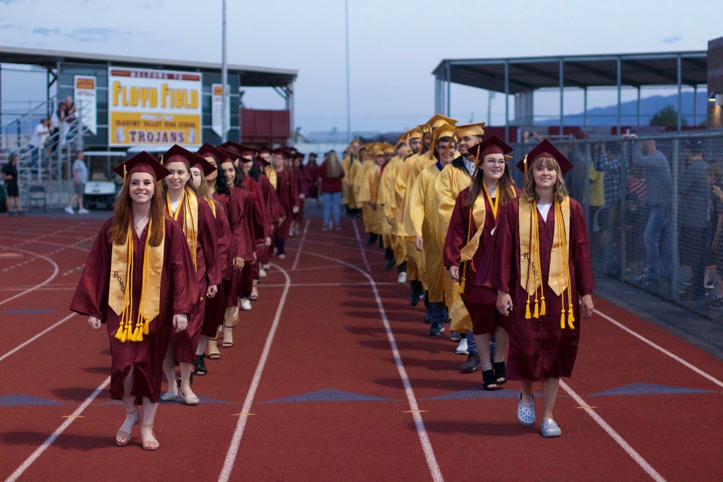 Graduates march in