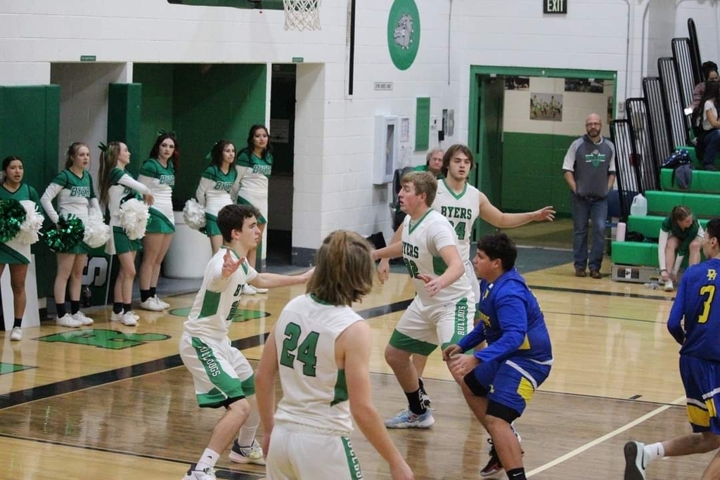 Boys Basketball players on the court playing