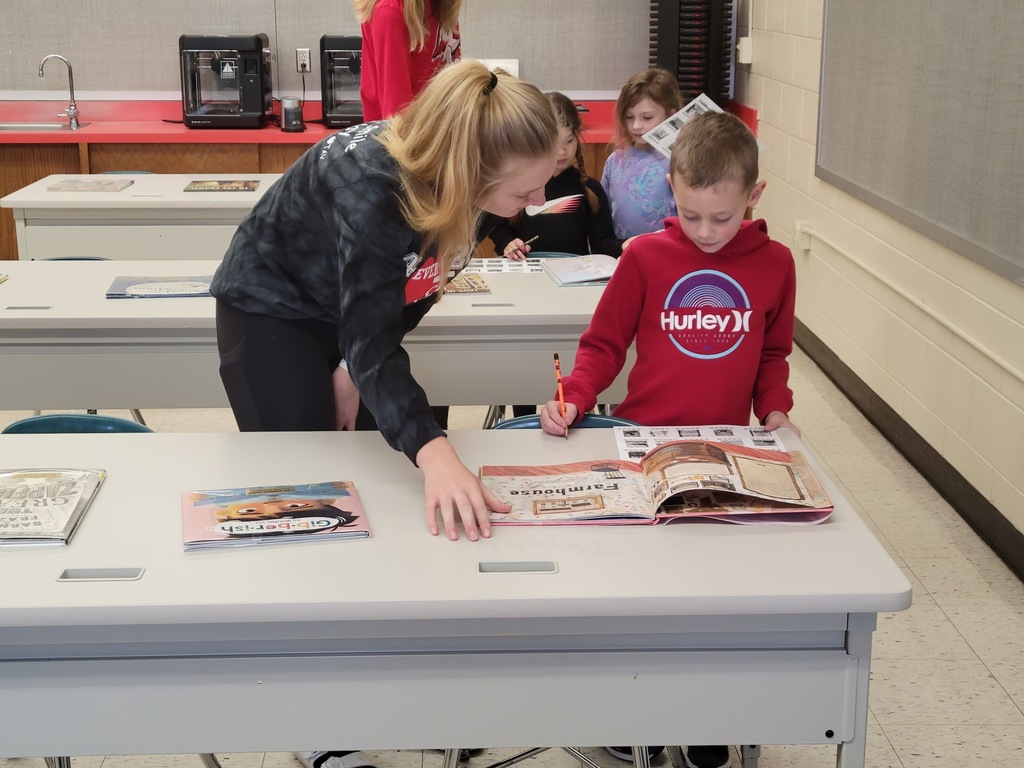 Child Development Students Working With Younger Students