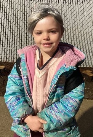 Gray-haired girl dresses up for 100 Days of School