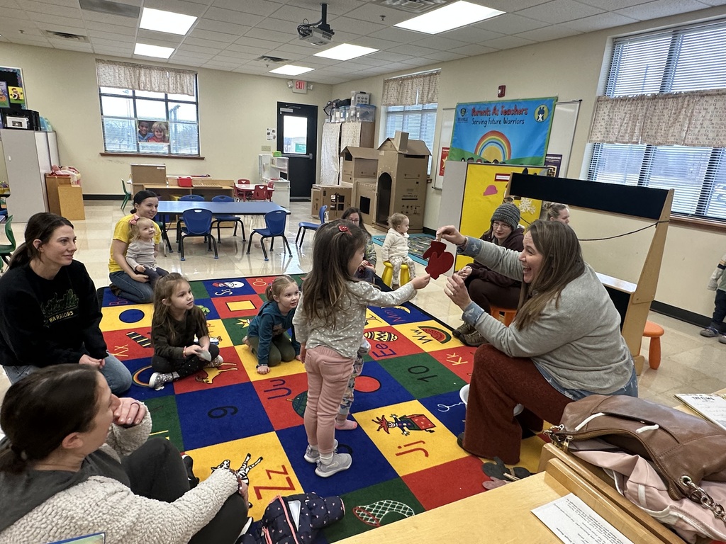 Little girl bring teacher her matching glove