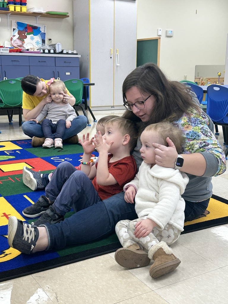 Parent sings along with little ones