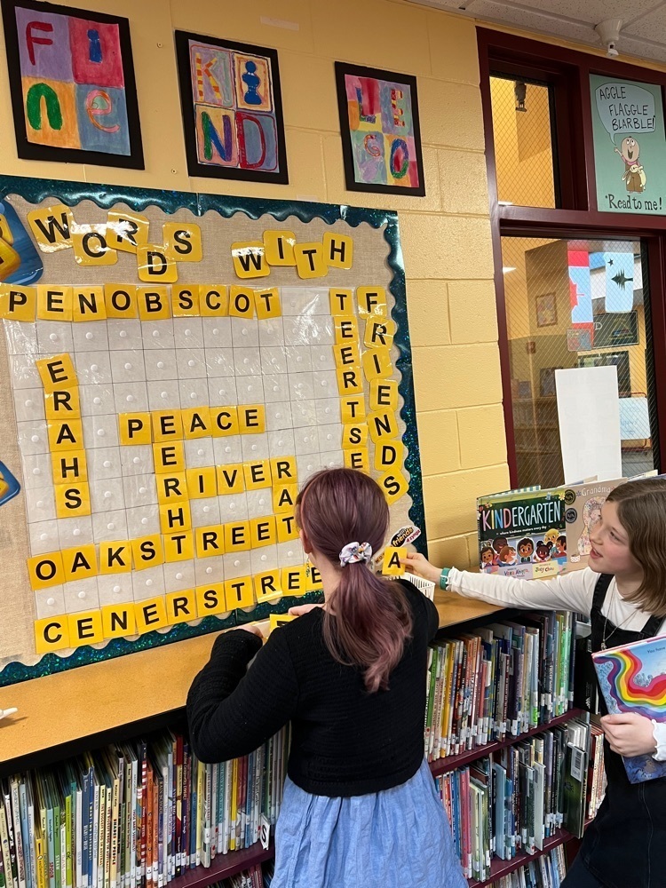 students complete a Words With Friends bulletin board