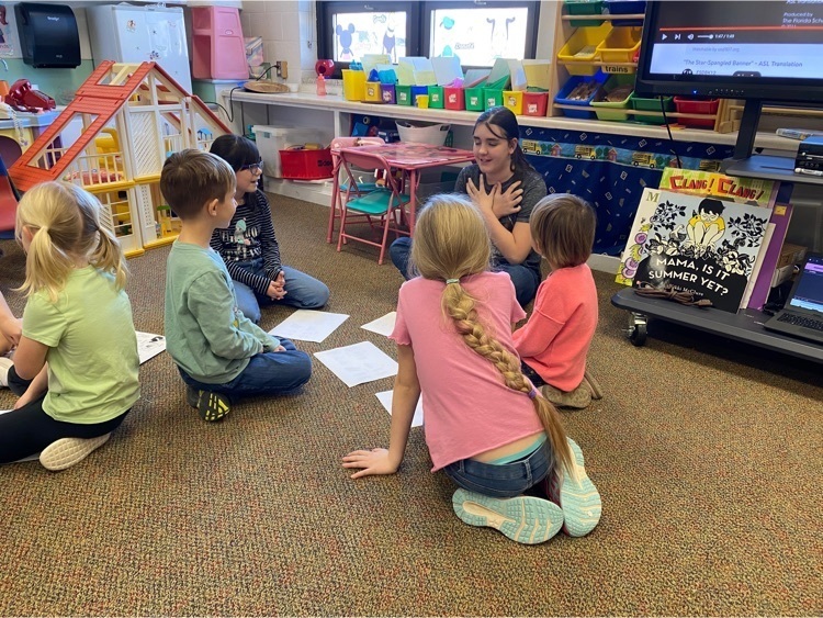 kids practicing ASL