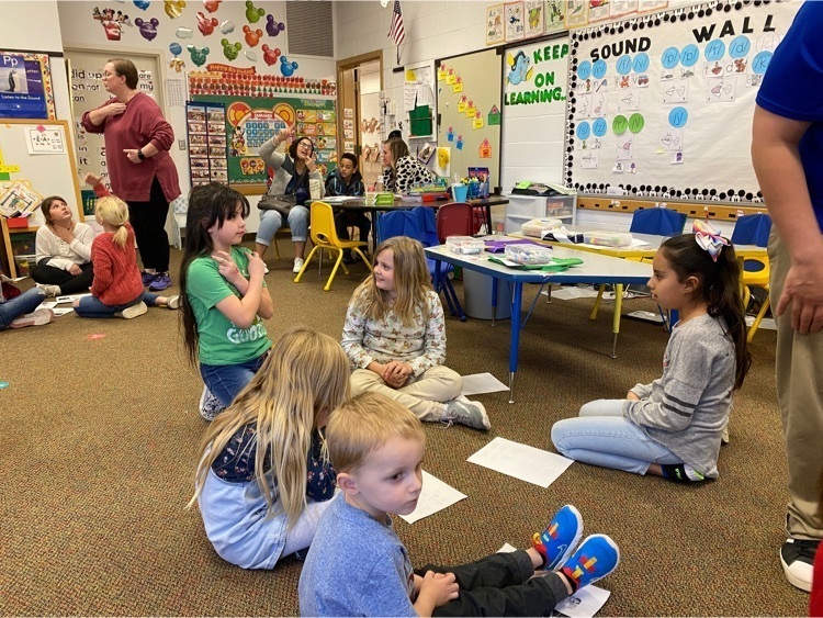 kids practicing ASL