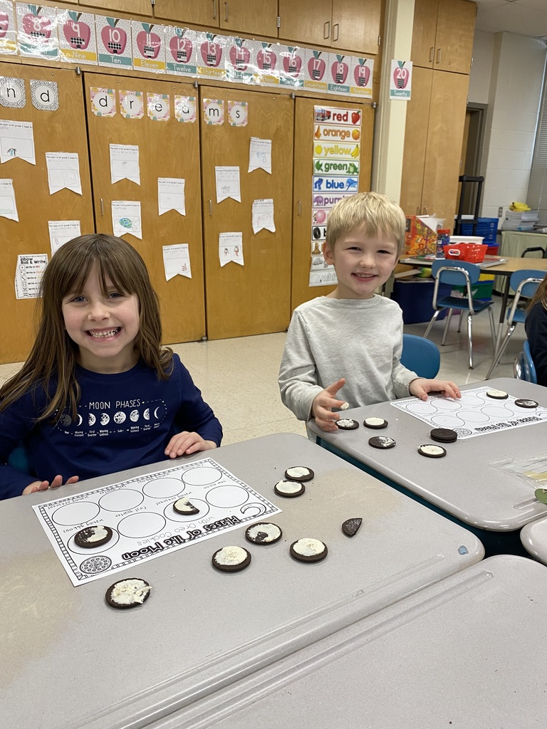 students with Oreos showing moon phases