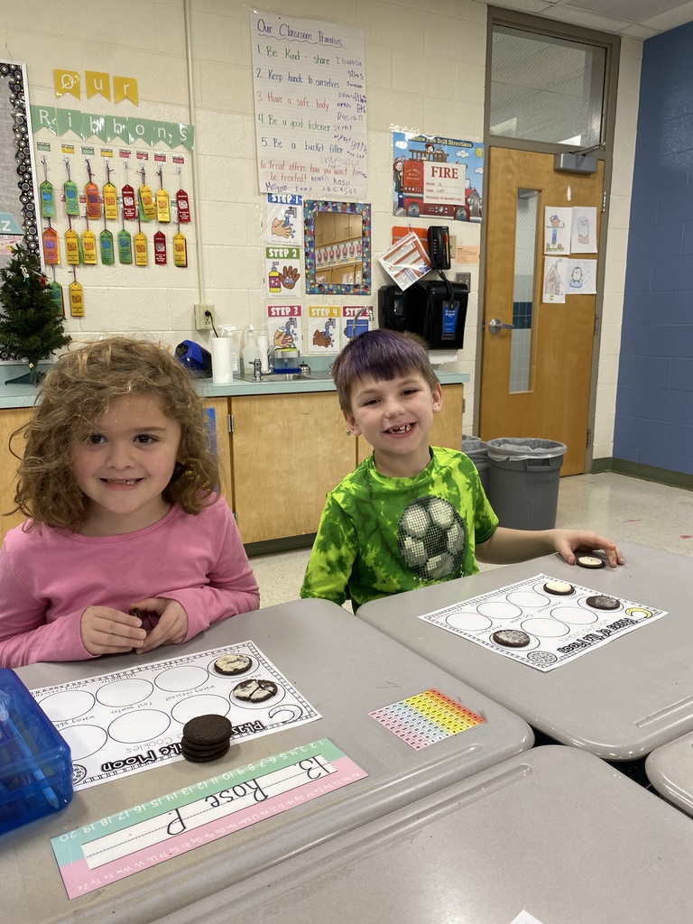 students with Oreos showing moon phases