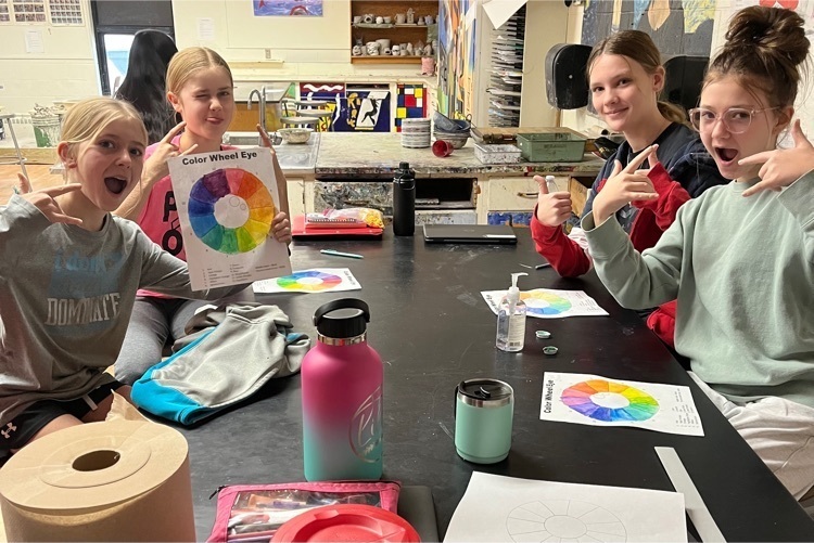 students painting