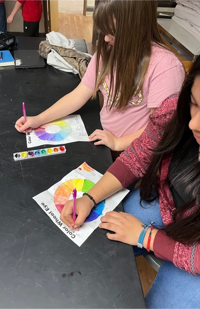 students painting
