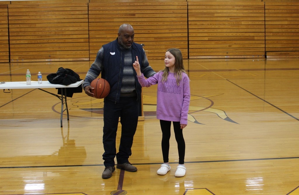 Melvin working with a student. 