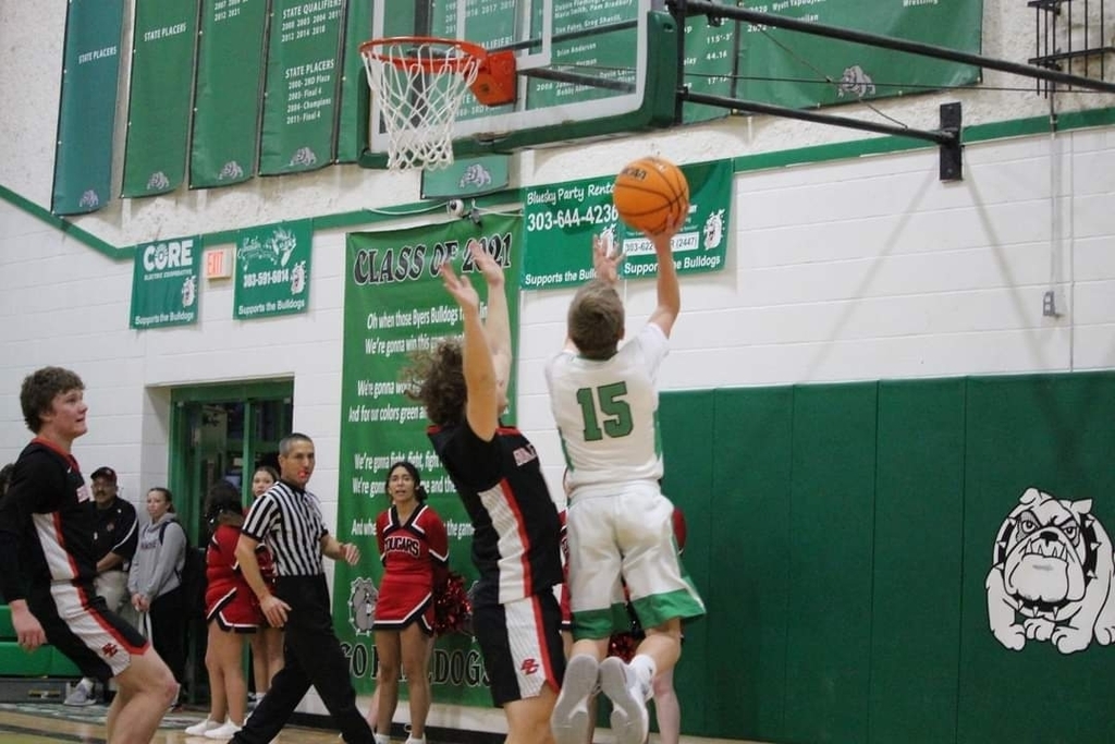 Byers Basketball player shooting a layup
