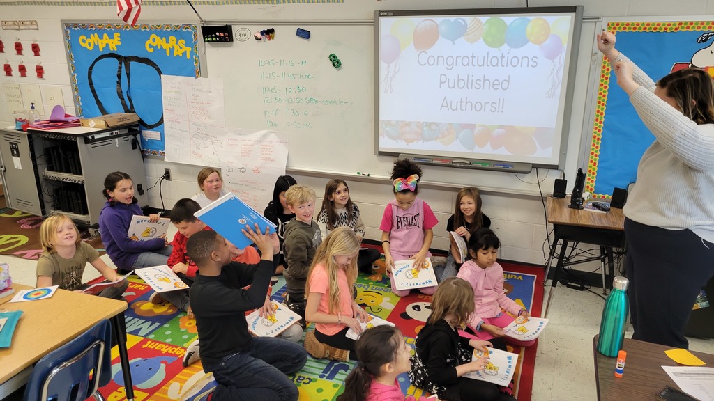 Students excited to receive copies of their self published books