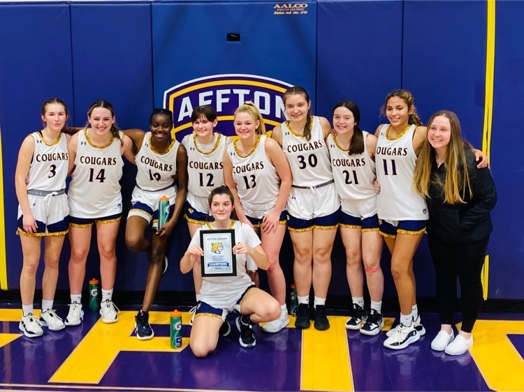 Champions of the Lady Cougar Invitational.