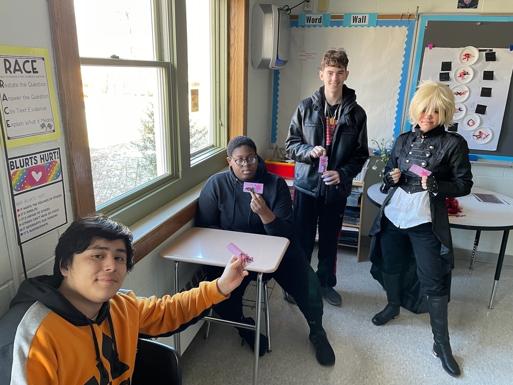 Students holding bubblegum