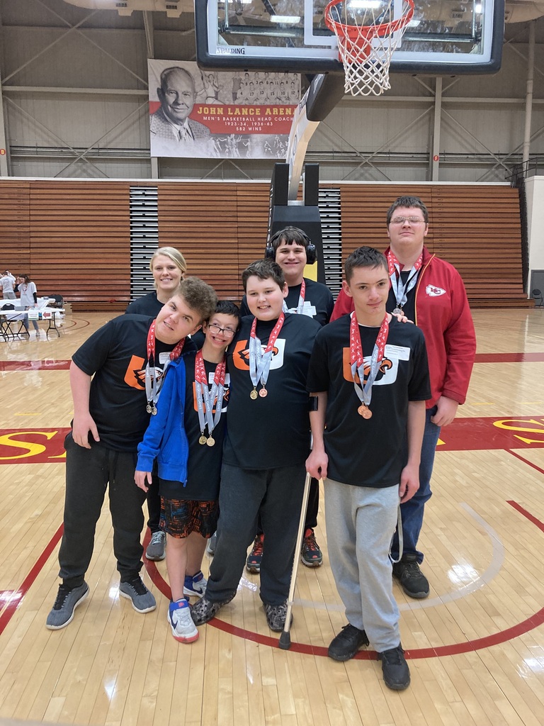 image of athletes with medals
