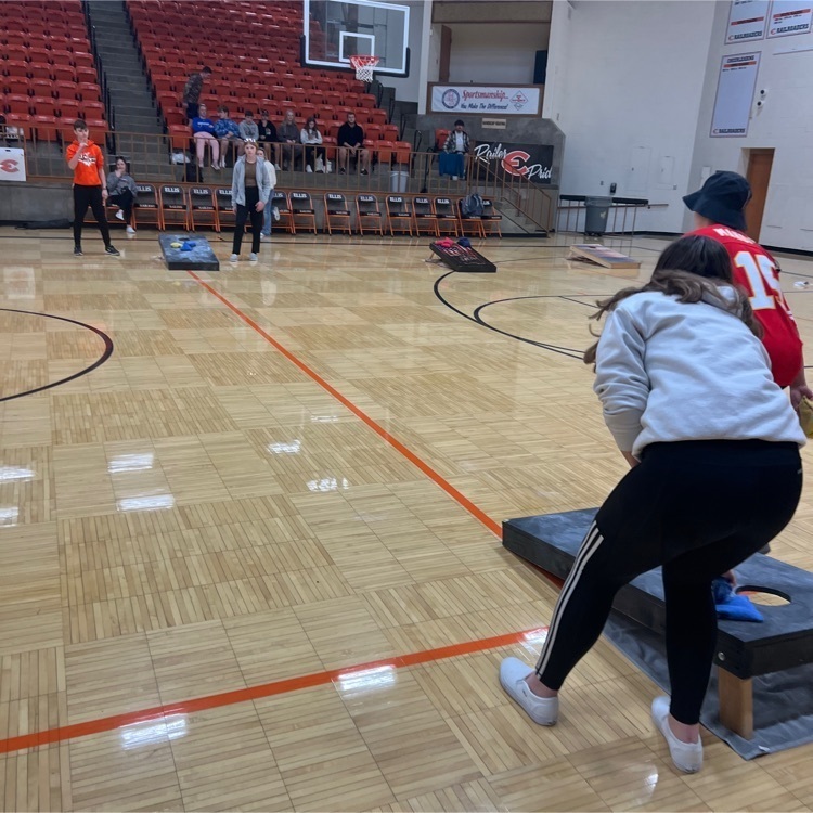 playing Corn hole during seminar.
