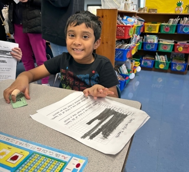 Male student from class 1G with his tooth graph