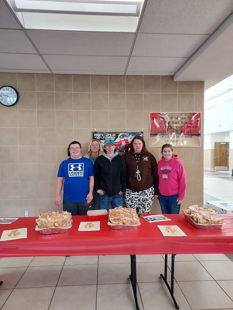 Owls Students selling goodies.
