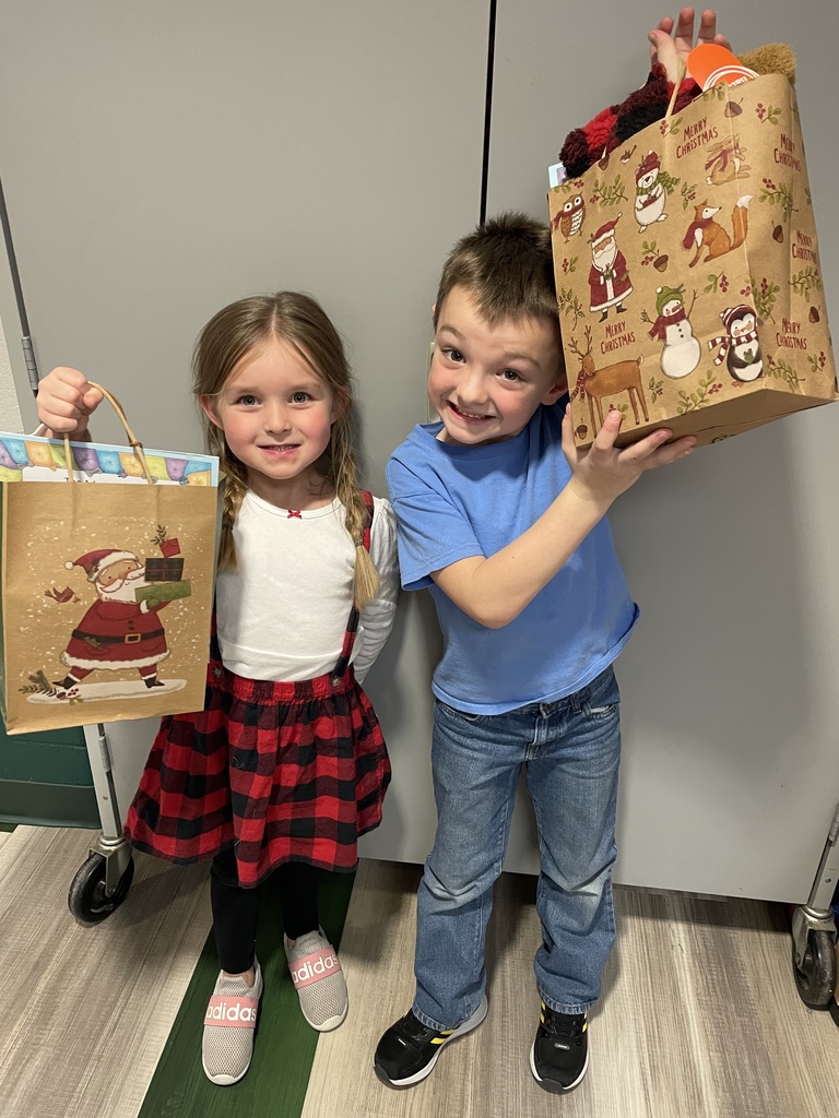 Florence Kindergarten students with gifts from Florence Hardwoods