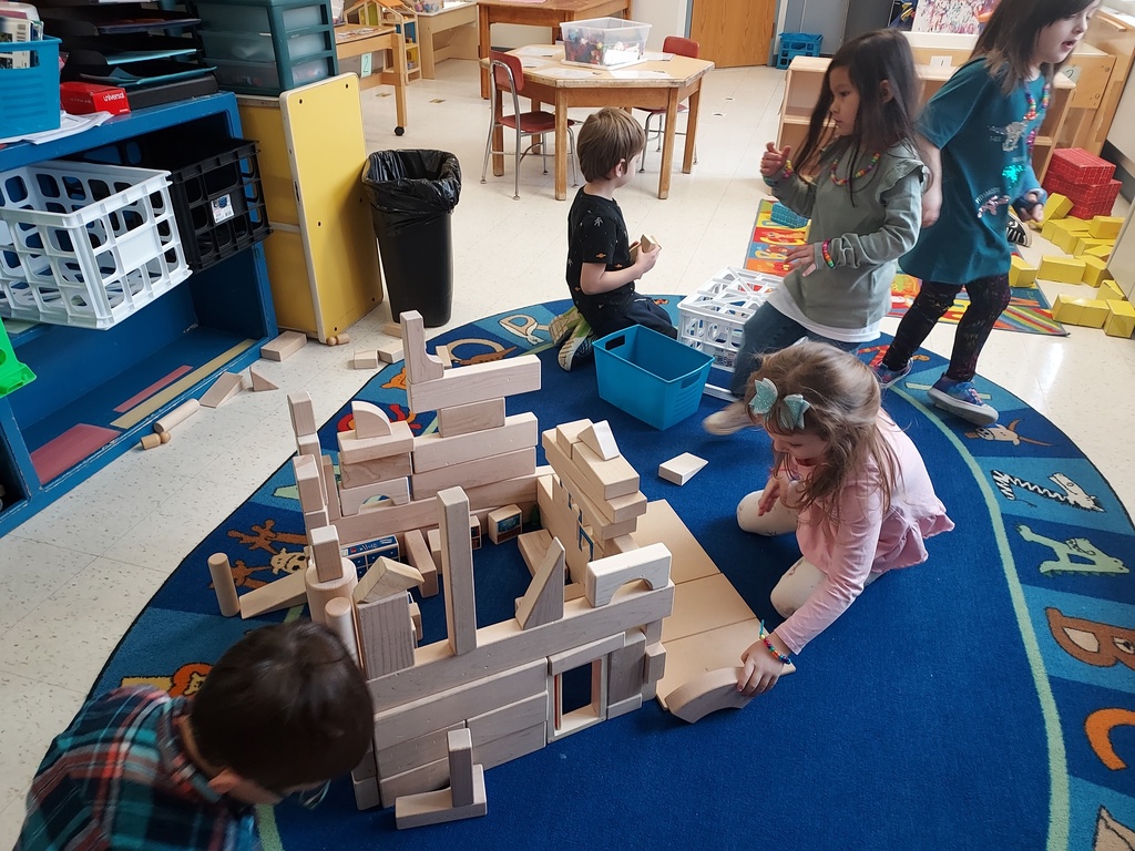 Children playing with wooden blocks