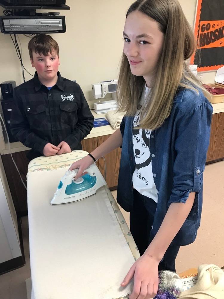 student ironing