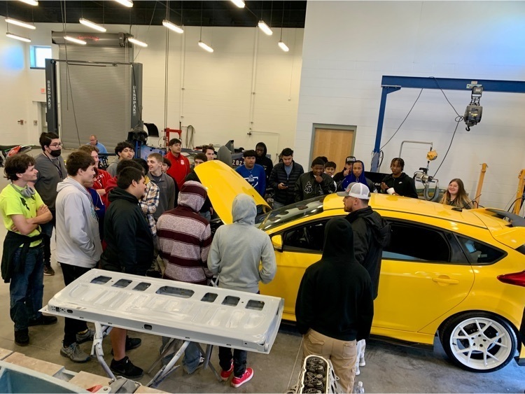 students with race car