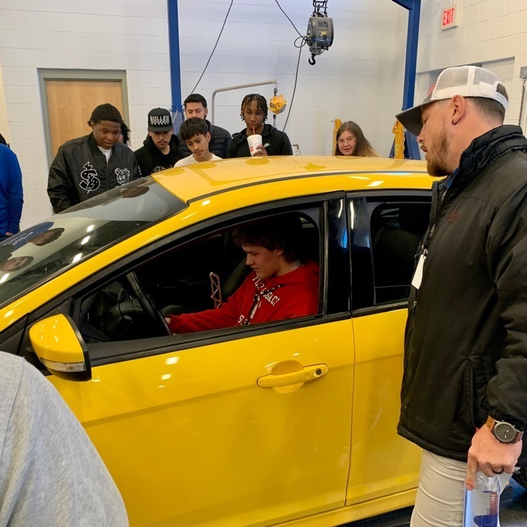student revving engine