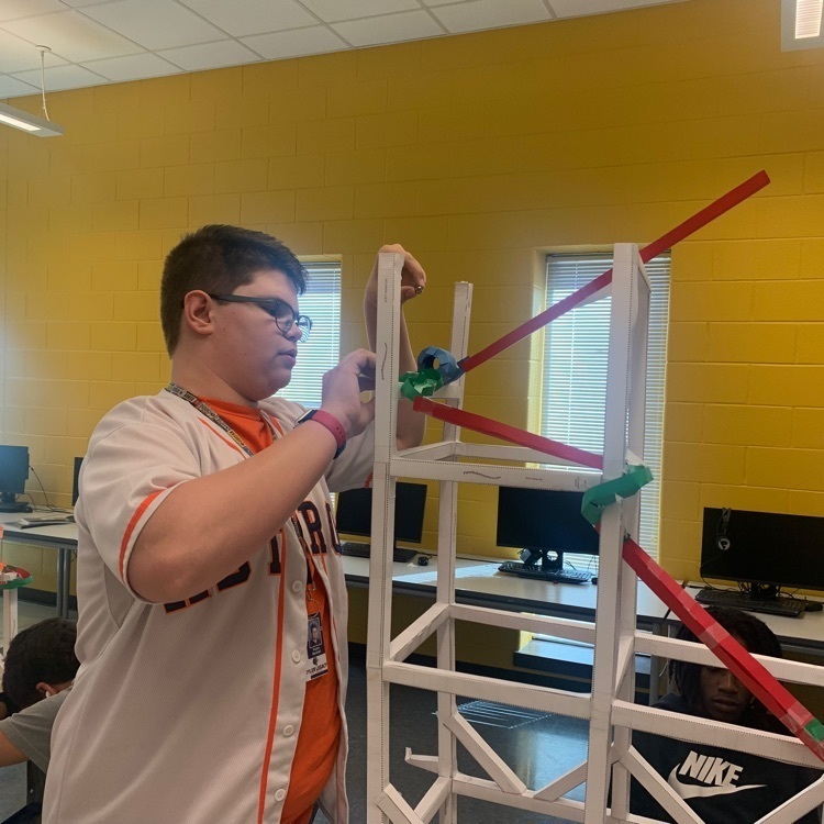 student adjusting roller coaster