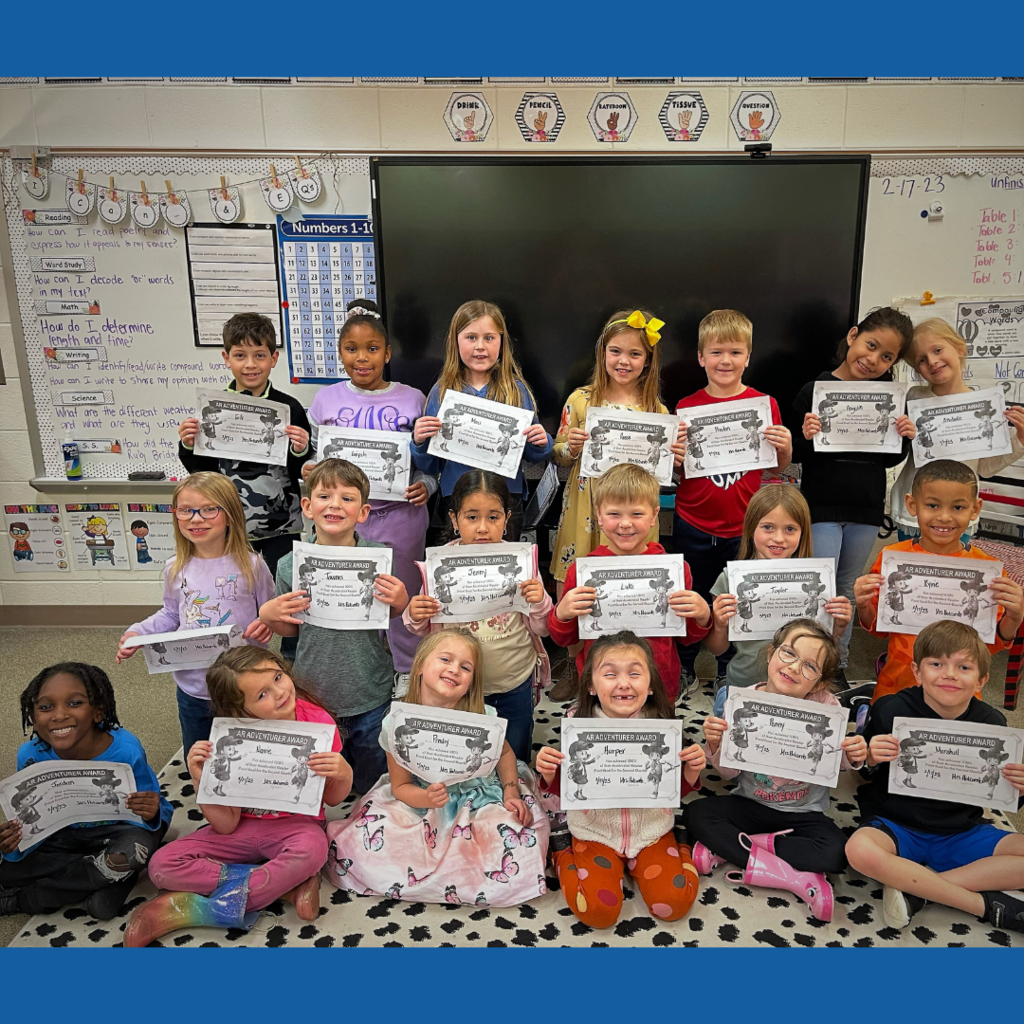 Mrs. Holcomb's first grade class met their AR goals.