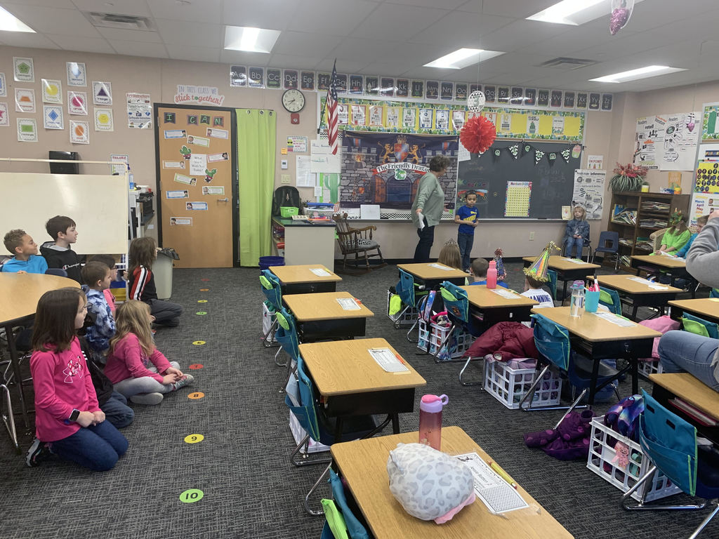 Students watch as The Friendly Dragon