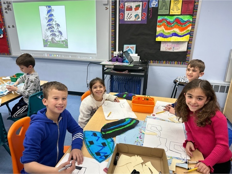 Wilson first grade students working on Yertle the Turtle-inspired pieces