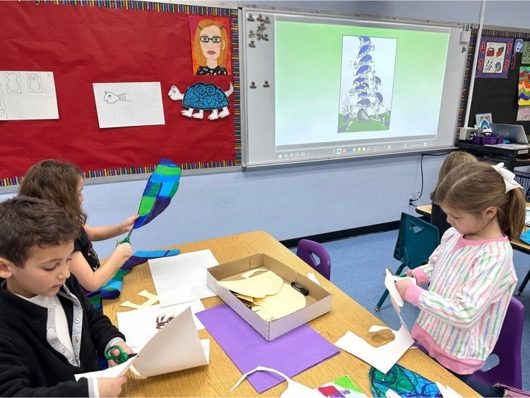 Wilson first grade students working on Yertle the Turtle-inspired pieces