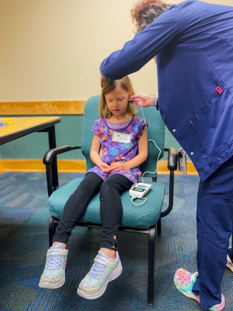 student getting hearing test