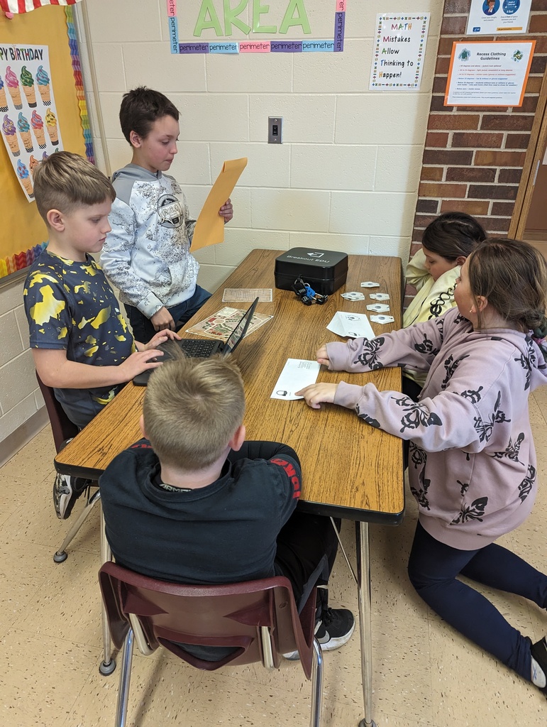 students work in teams to solve the puzzles and unlock the locks on the Breakout boxes