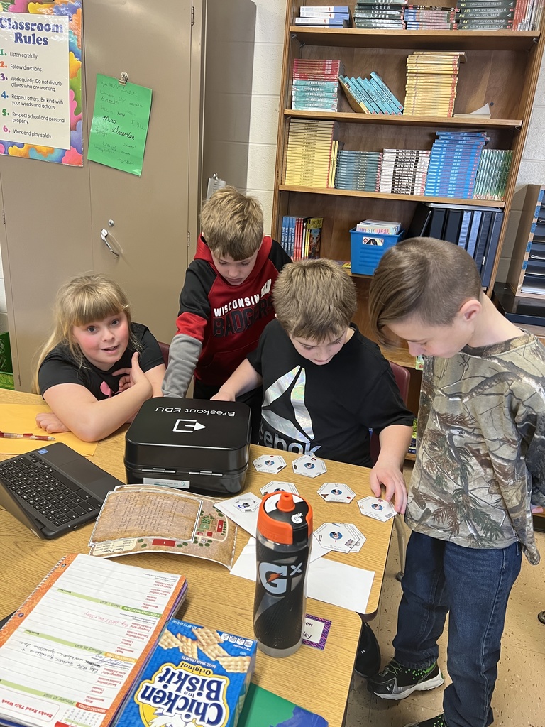 students work in teams to solve the puzzles and unlock the locks on the Breakout boxes