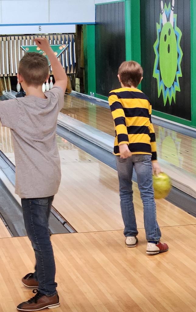 2 students are bowling