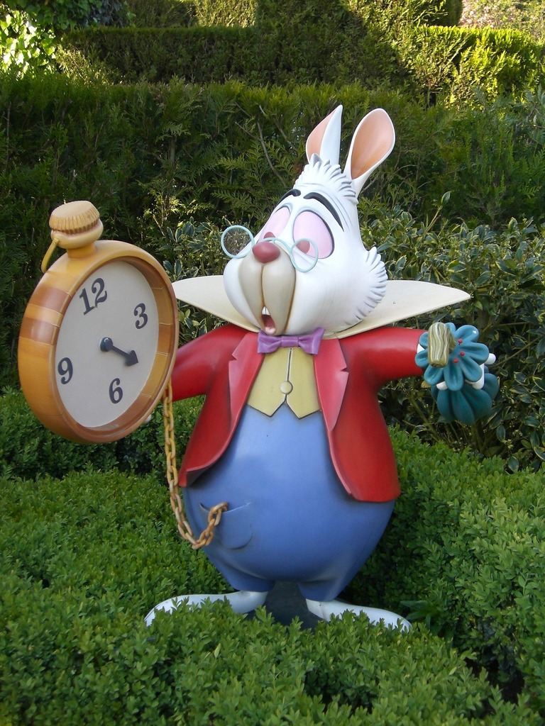 Rabbit from Alice in Wonderland looking at a clock