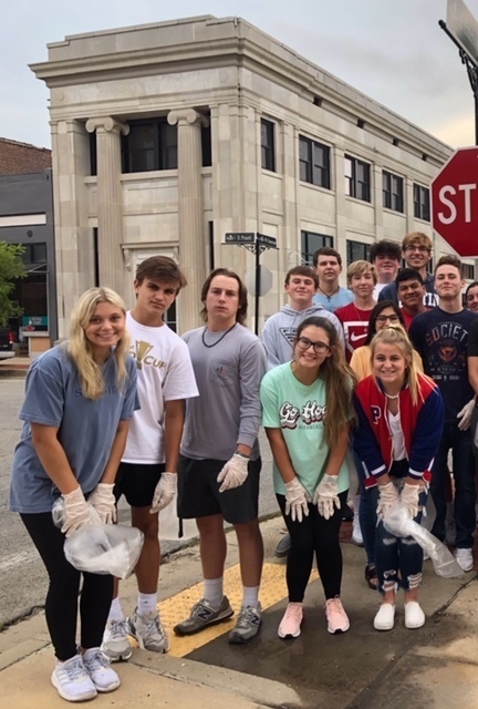 Students cleaning Pruitt Street