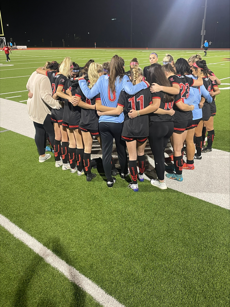 Lady Raider soccer in pre-game huddle