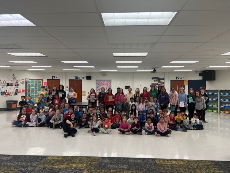 A large group picture of all the middle school readers with 3 kindergarten classes 