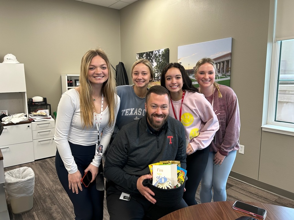 Legacy students with Mr. Sherman and an appreciation gift they gave him