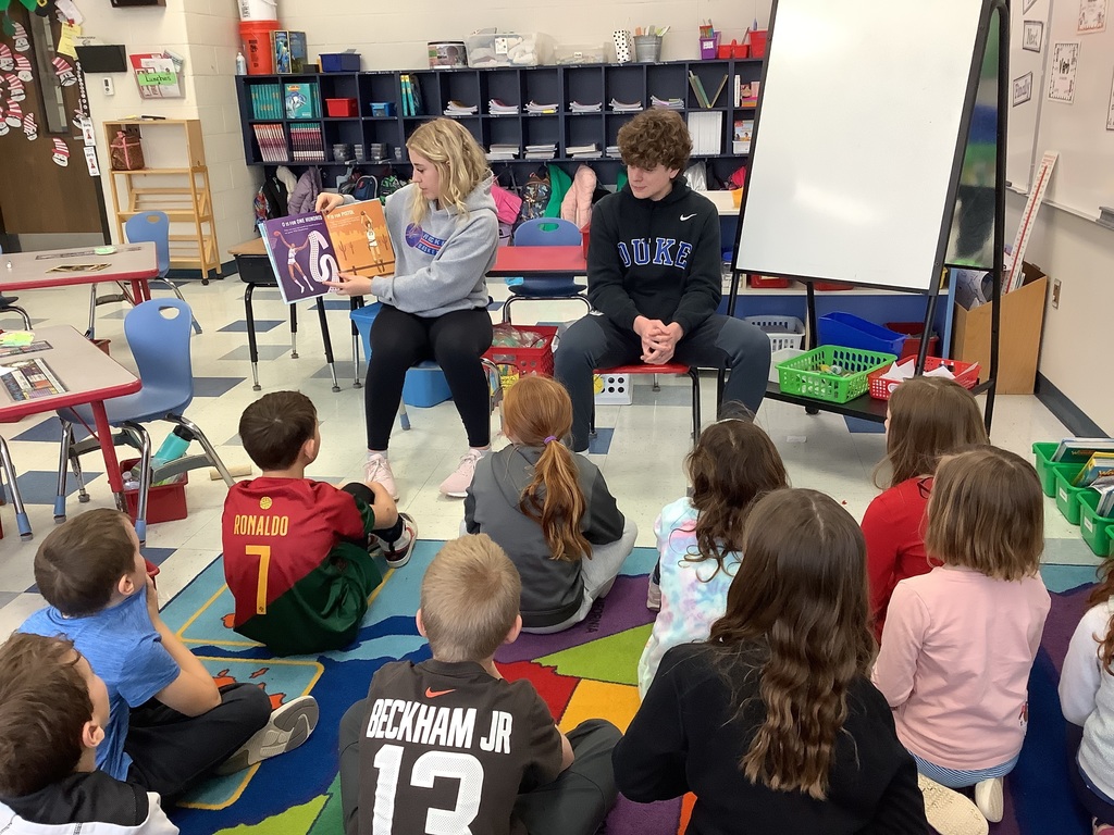 Basketball players read to Normandy kids