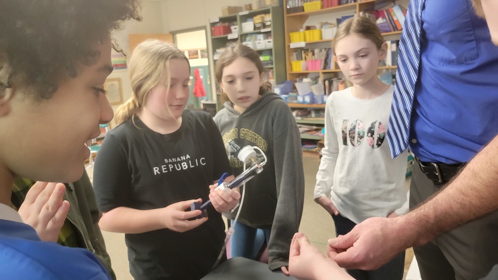 Students practiced inflating a stent.