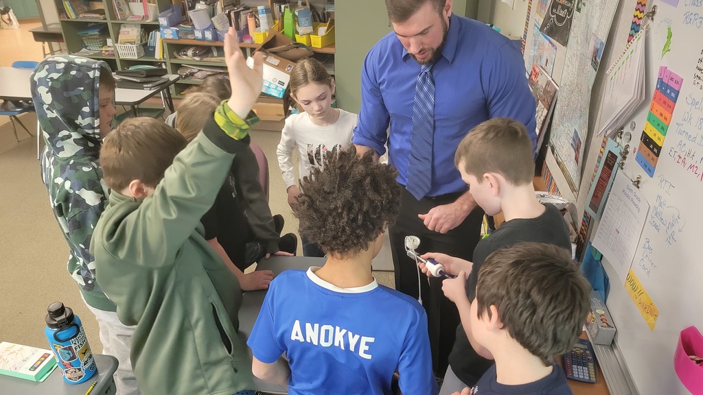 Student practice inflating a stent