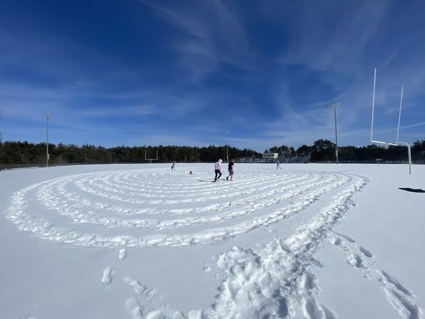 students walking in the snow