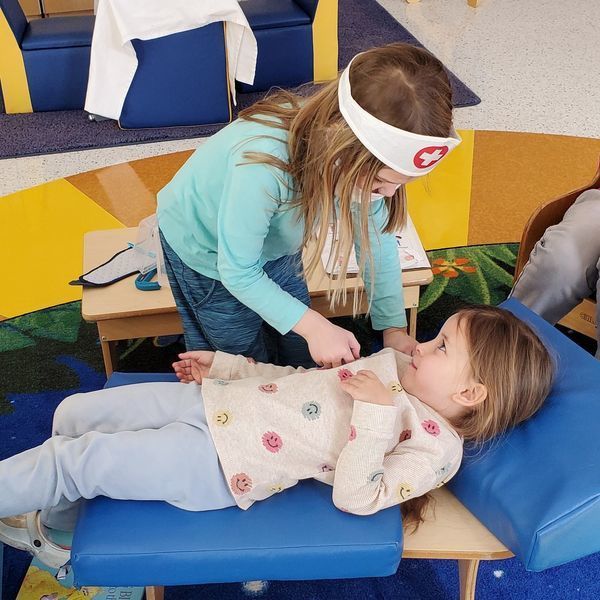children acting as doctors